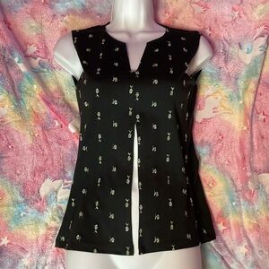 Malibu black top slit middle floral pattern size M